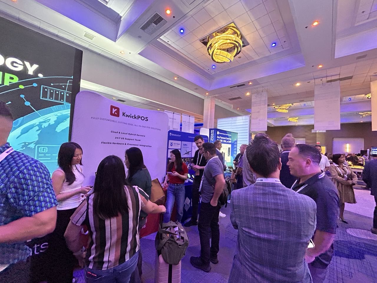 Payment professionals visiting the KwickPOS booth at WSAA 2026